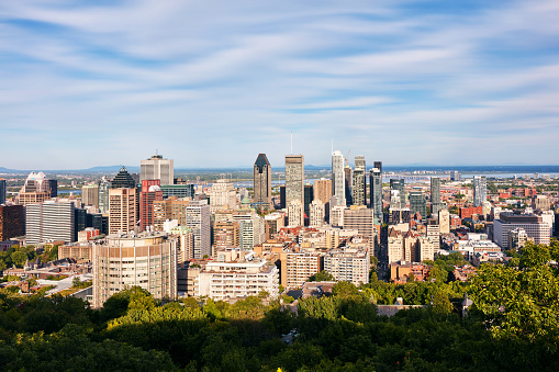 Montreal, Canada - June, 2018: Montreal city skyline view from Mount Royal on a sunny summer afternoon in Quebec, Canada. Editorial use.