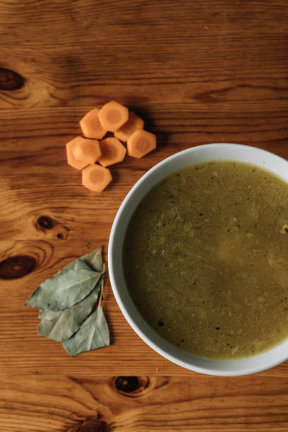 Vegetable soup on a wooden table