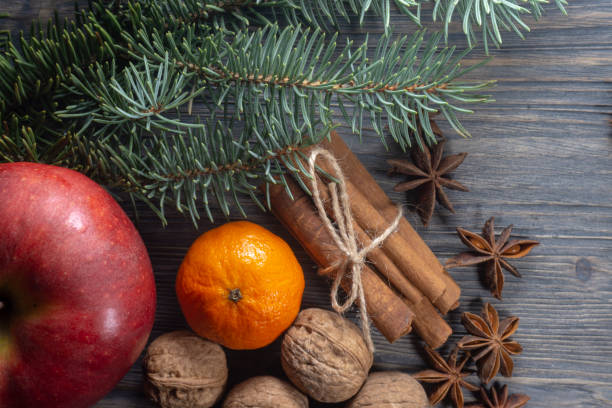 istock Bunch of cinnamon orange anise next to pine branch 1091283912
