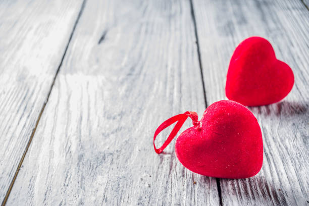 istock Wooden valentines background with red heart 1091294362
