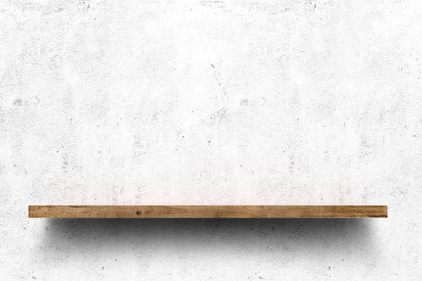shelf Wooden shelf over white concrete wall background shelf stock pictures, royalty-free photos & images