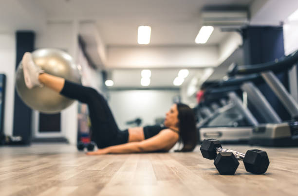 istock Mature woman exercises with pilates ball 1091307054