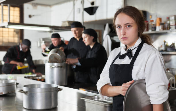istock Tired and upset waitress in kitchen of restaurant 1091309332