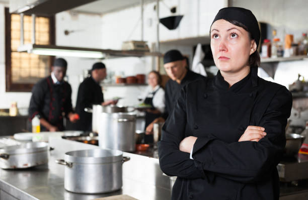 istock Upset female cook in kitchen of restaurant 1091309336