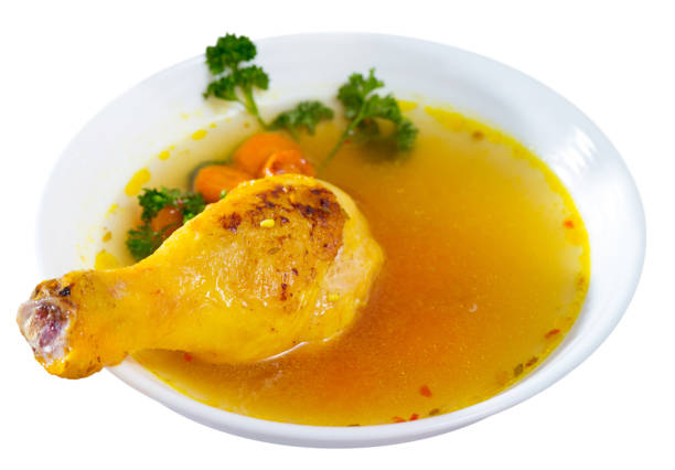 istock Thin soup with chicken leg in white bowl 1091318316