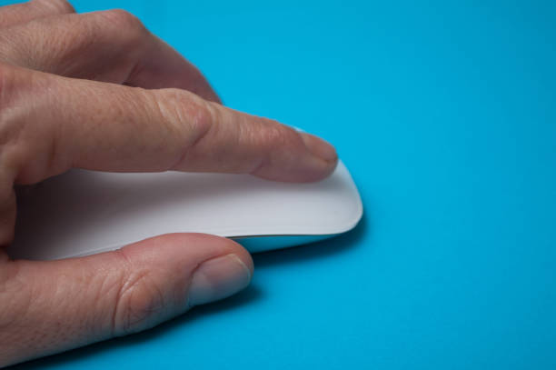 Closeup of a office lady clicking the mouse.
