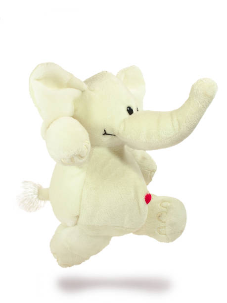 istock Valentine's holiday, red heart, white plush elephant, jumping 1091326400
