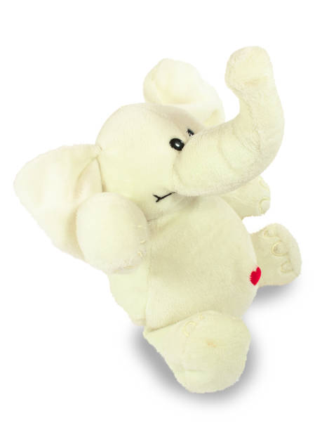 istock Valentine's holiday, red heart, white plush elephant, sits 1091326518