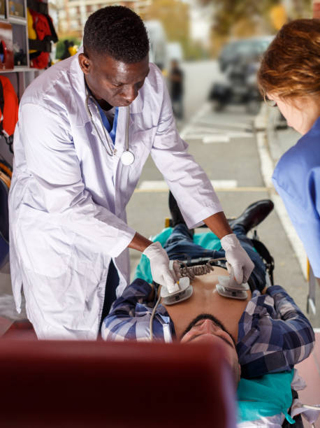 istock Rescue team making defibrillation to patient 1091328550