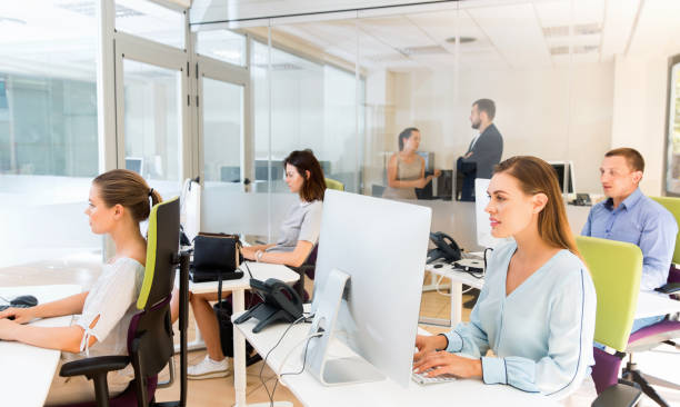 istock Group of successful business people during daily work in modern co-working space 1091328672