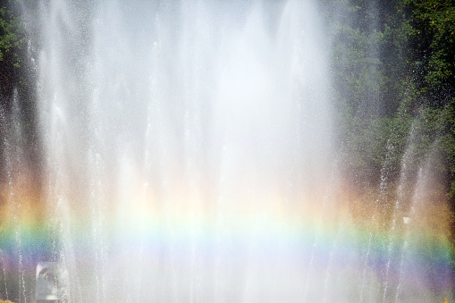 rainbow on the background of spray fountain