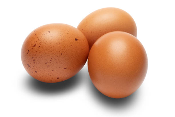 istock brown chicken eggs closeup isolated on white background 1091336156