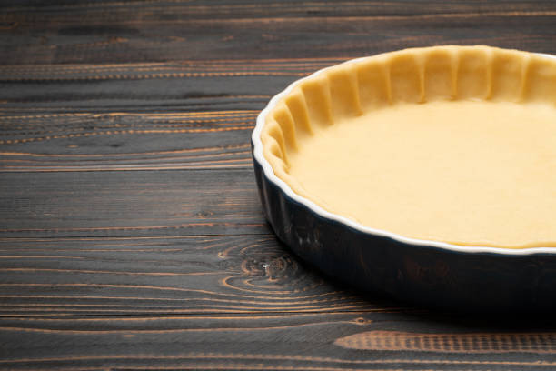 istock shortbread dough for baking quiche tart in baking form 1091336368