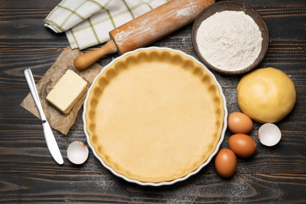 istock shortbread dough for baking quiche tart and ingredients in baking form 1091336458
