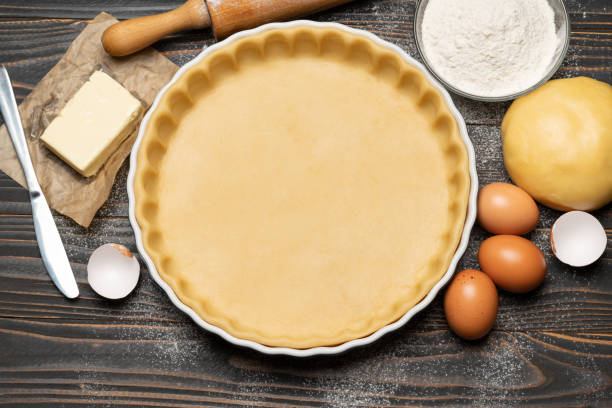 istock shortbread dough for baking quiche tart and ingredients in baking form 1091336486