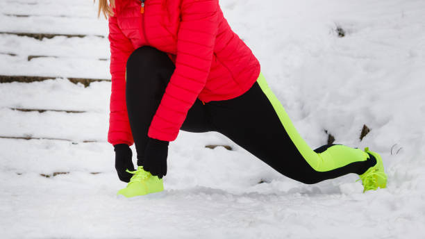 istock Woman exercising legs outside during winter 1091340062