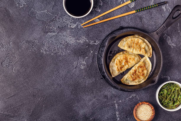 istock Gyoza or dumplings snack with soy sauce 1091342648