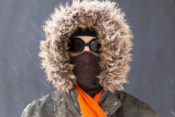 Portrait of a single male winter adventurer with vintage style goggles stock photo