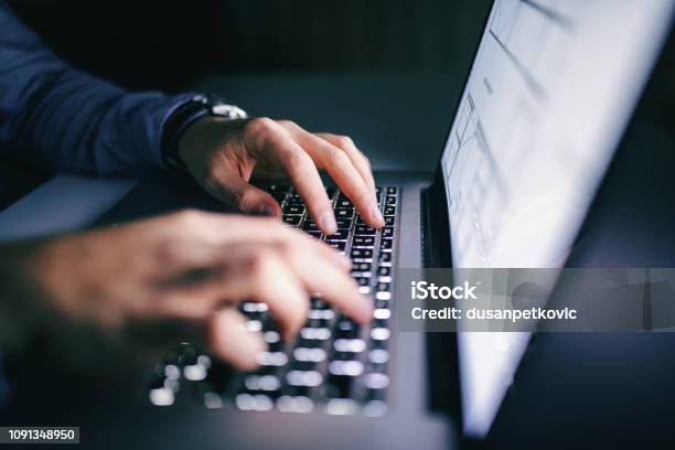 Close Up Of Hands Typing On Laptop Night Work Concept Stock Photo - Download Image Now