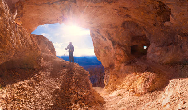 istock A man in mainsails and caves, sunset 1091351232