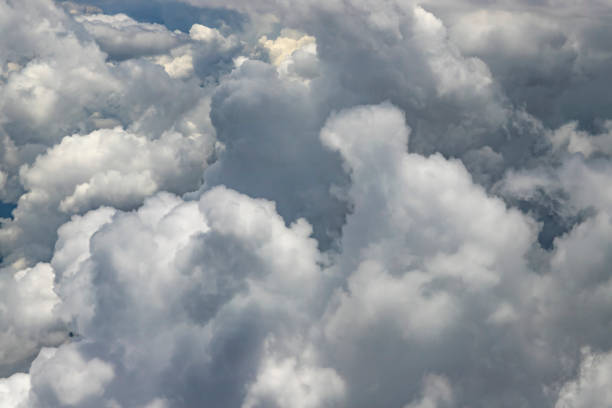 istock Flying above a dense layer of white clouds 1091354374