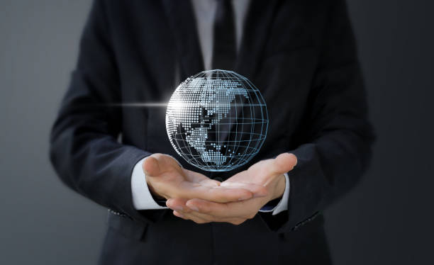 istock Businessman holding digital world map in hand 1091358762