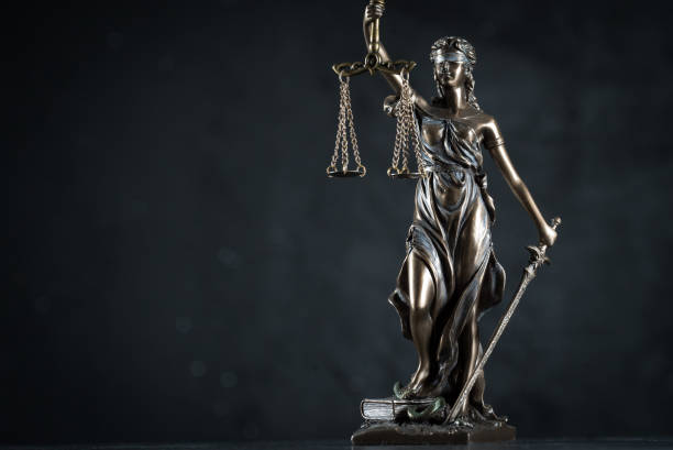 istock Law and Justice symbols on dark background 1091363154