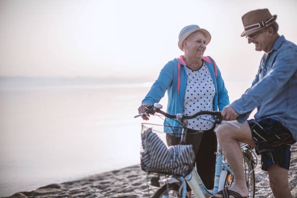 istock Active seniors couple with bike 1091363978