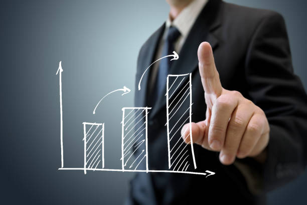 istock Businessman growth chart graph pointing touching screen business strategy 1091368074