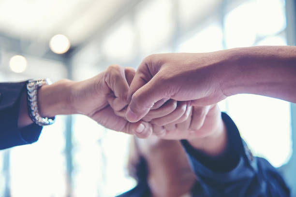 istock Business partner people joining and stack hand together after contract finished meeting. Teamwork Concept 1091369656