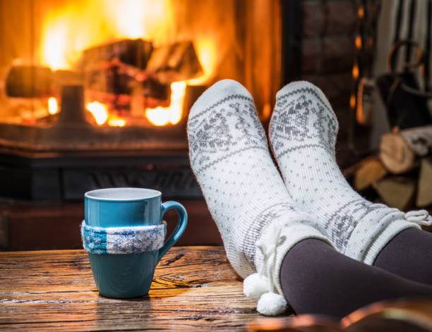 istock Warming and relaxing near fireplace. 1091389870
