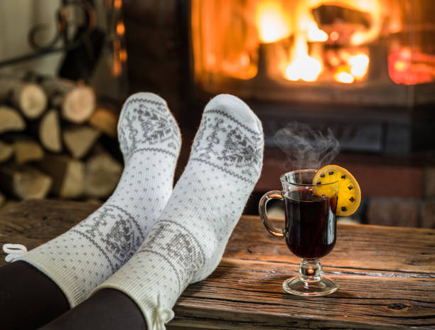 istock Warming and relaxing near fireplace. 1091390118