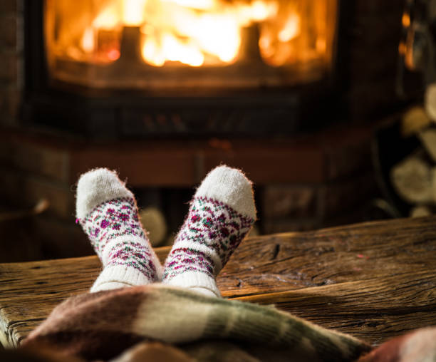 istock Warming and relaxing near fireplace. 1091391590
