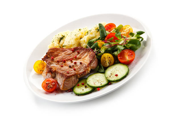 istock Grilled steak with puree and vegetables 1091392898