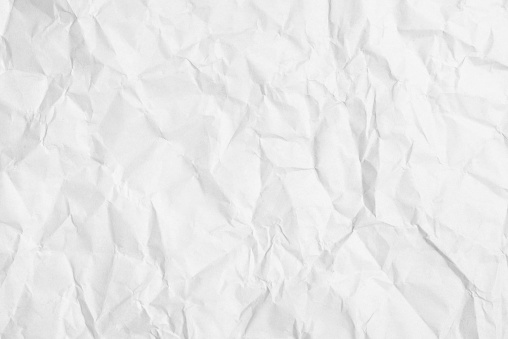 Old crumpled sheet of white paper