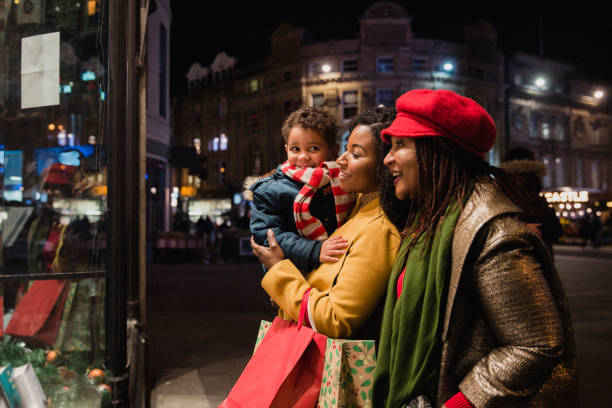 istock Family Looking in Store Window 1091398342