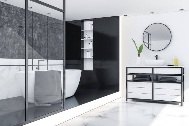 istock White marble bathroom, sink and tub, side view 1091398358