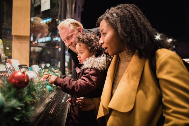 istock Young Girl Choosing a Gift for Christmas 1091400598