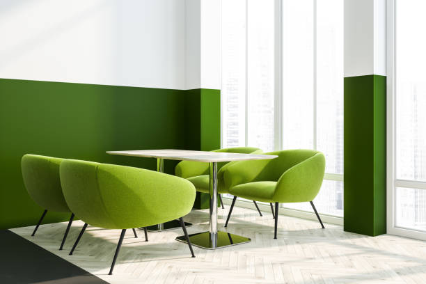istock Close up of cafe table, green armchairs 1091403874