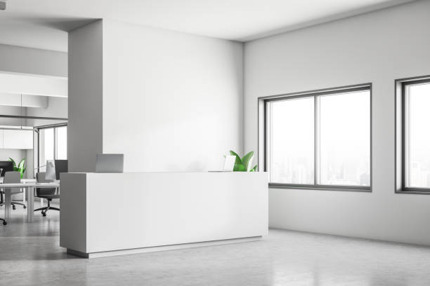 istock Corner of white office with reception 1091404830