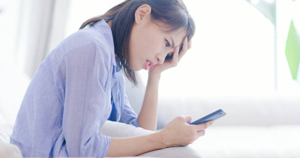 istock woman suffer from Internet bullying 1091406784