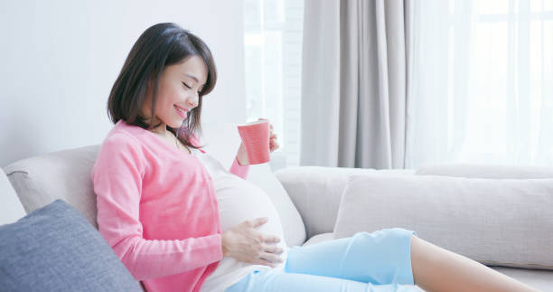 istock pregnant woman drink tea 1091406942