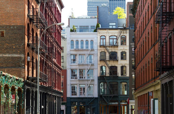 New York City buildings in the SoHo neighborhood of Manhattan New York City buildings at the intersection of Crosby and Howard Street in the SoHo neighborhood of Manhattan NYC brooklyn new york photos stock pictures, royalty-free photos & images