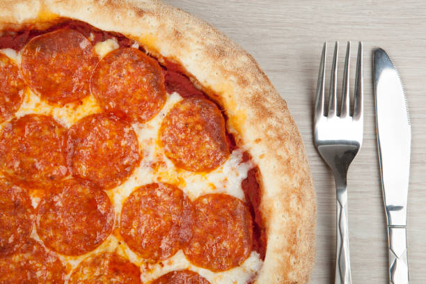 istock fresh hot pepperoni pizza with sausage close up 1091410238