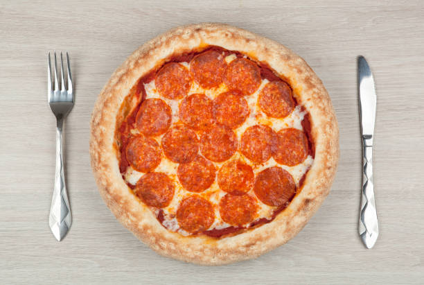 istock fresh hot pepperoni pizza with sausage 1091410268