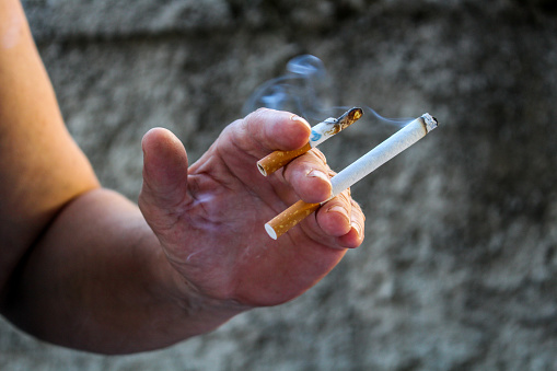 smoking 2 cigarettes Chain Smoker | A woman two at a time | Rainer Tenhunen Two cigarettes a day still