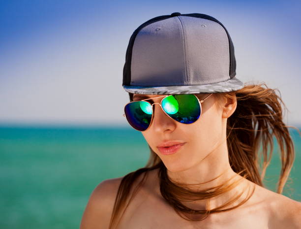 istock Sea. Face, sunglasses, baseball hat, close up 1091416212