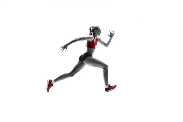 istock one caucasian woman running on white background 1091416596