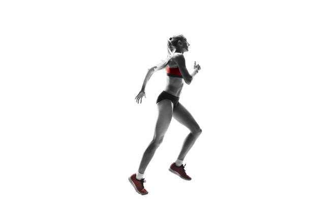 istock one caucasian woman running on white background 1091416628