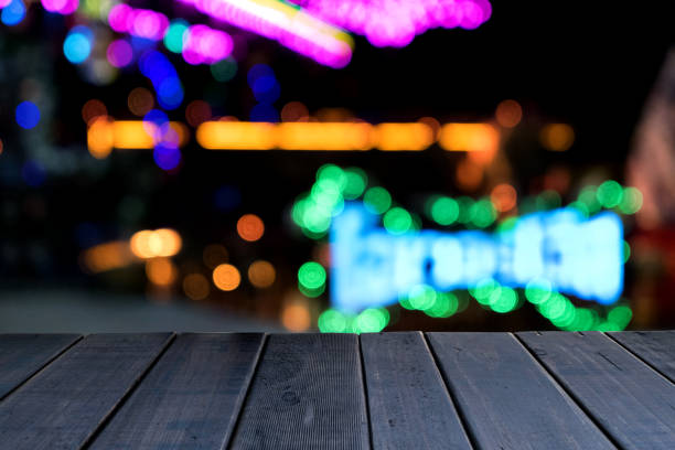 istock Brown wooden on front blurred colorful traffic background, use for presnetation and template website product 1091416706